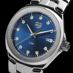 The elegant replica TAG Heuer Link WBC1318.BA0600 watches have blue dials, diamond hour marks and date windows.