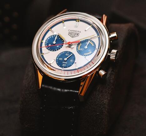 The blue subdials and red second is are contrasted to the silver dial.